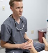 Las Vegas Podiatrist Examining Foot